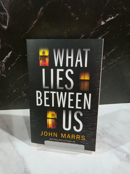 John Marrs - What Lies Between Us